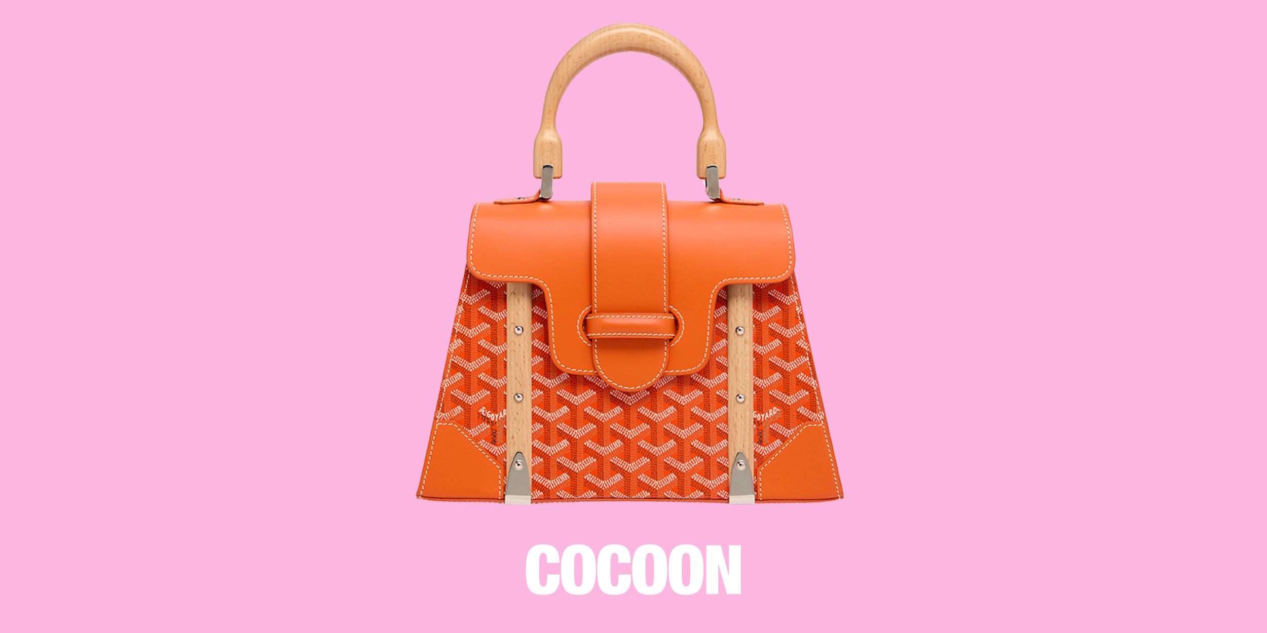 Cocoon Club bag in bright orange is available for rent.