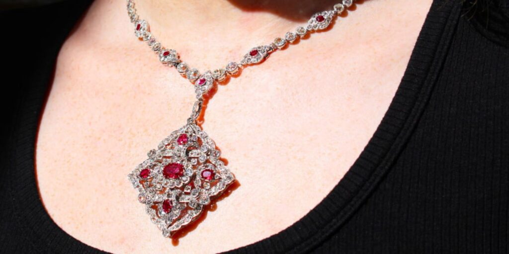 Circular jewellry by Hatton Jewels, an antique necklace of a ruby in silver and diamonds.