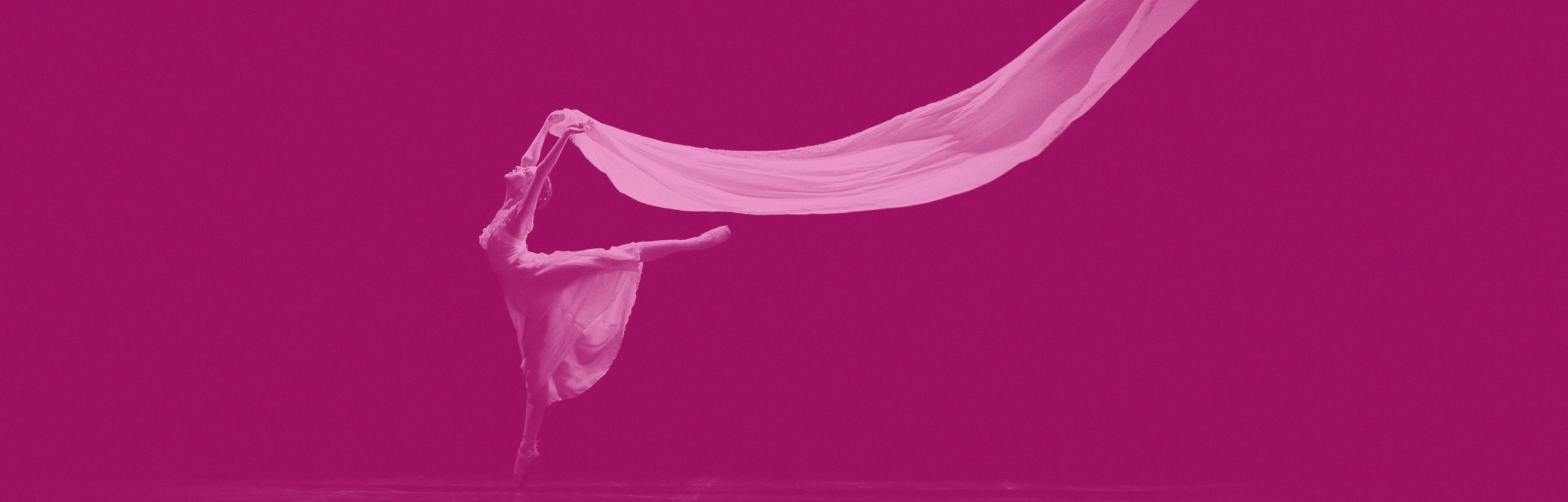 Ballerina on a stage with a pink overlay filter