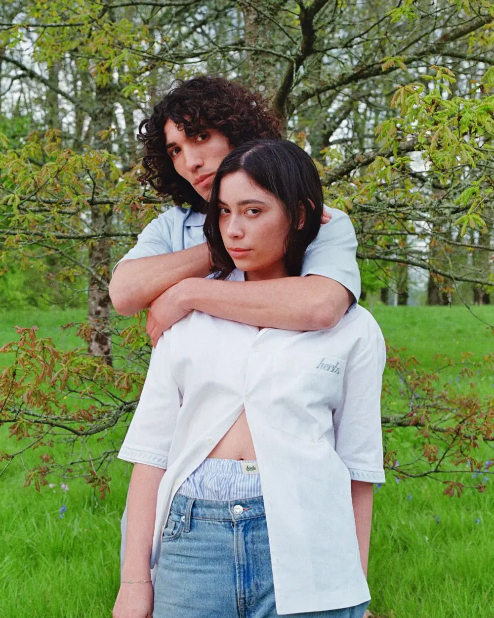 Models wearing Embroidered White Cuban Shirt, baby blue embroidered Cuban shirt and Herb boxers