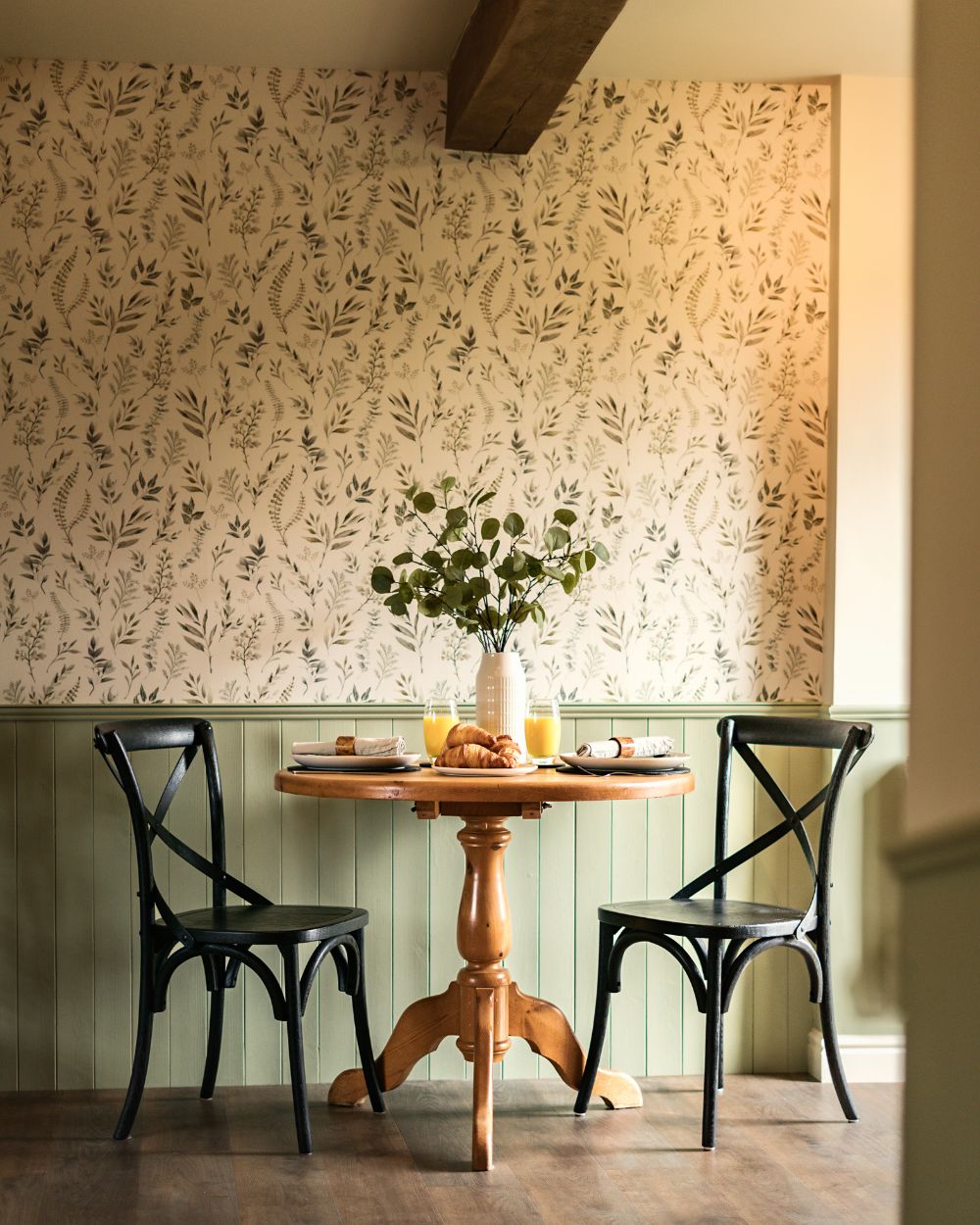 Wild & Co cottage interior, showing a table and two chairs