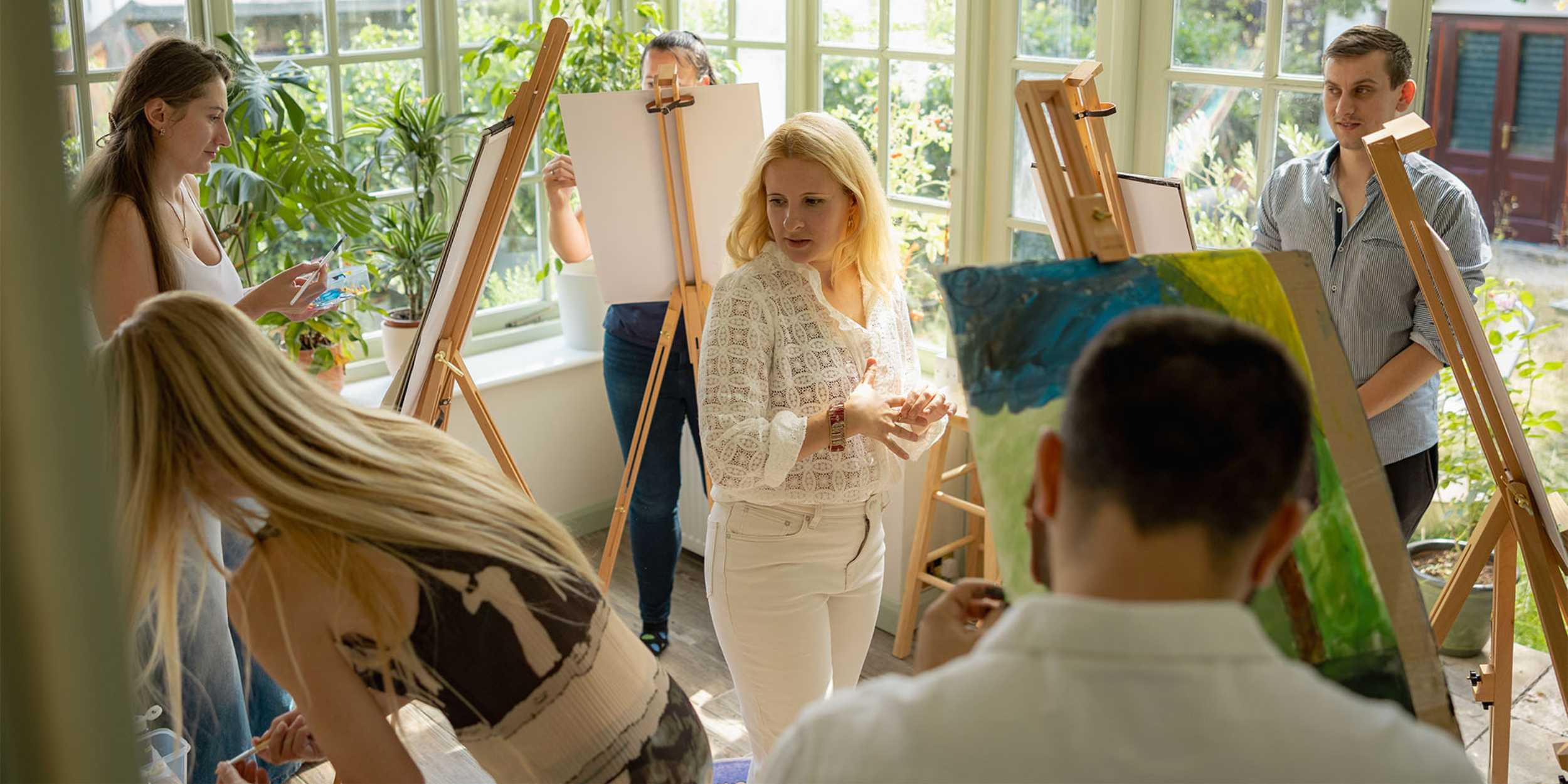 Anya Liesnik and students in her therapeutic art session.