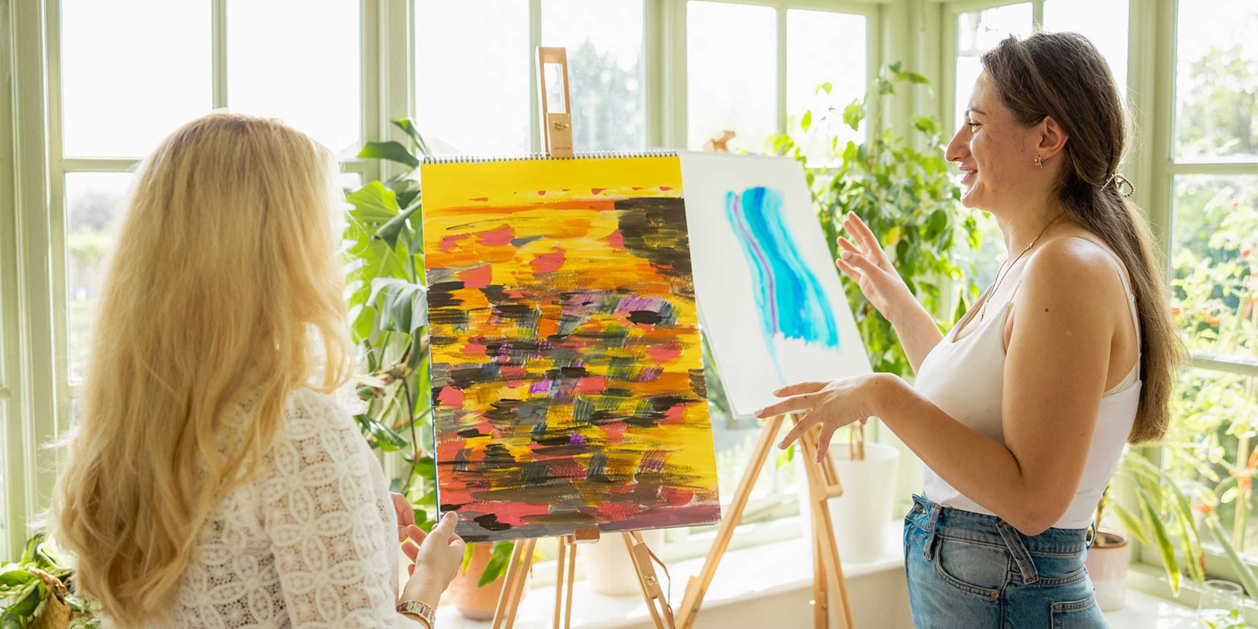 Anya Liesnik and a student in her therapeutic art session.