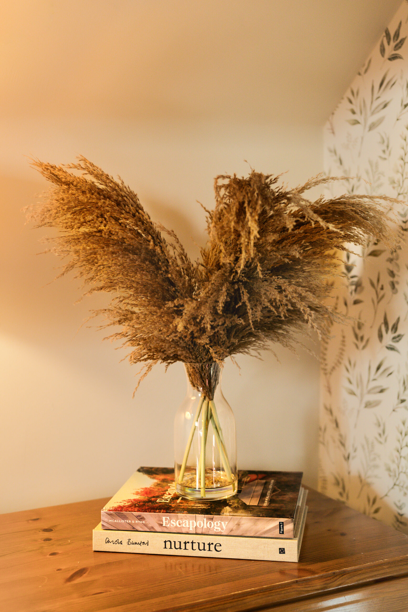 Interior of a Wild & Other cottage with blooms in a vase