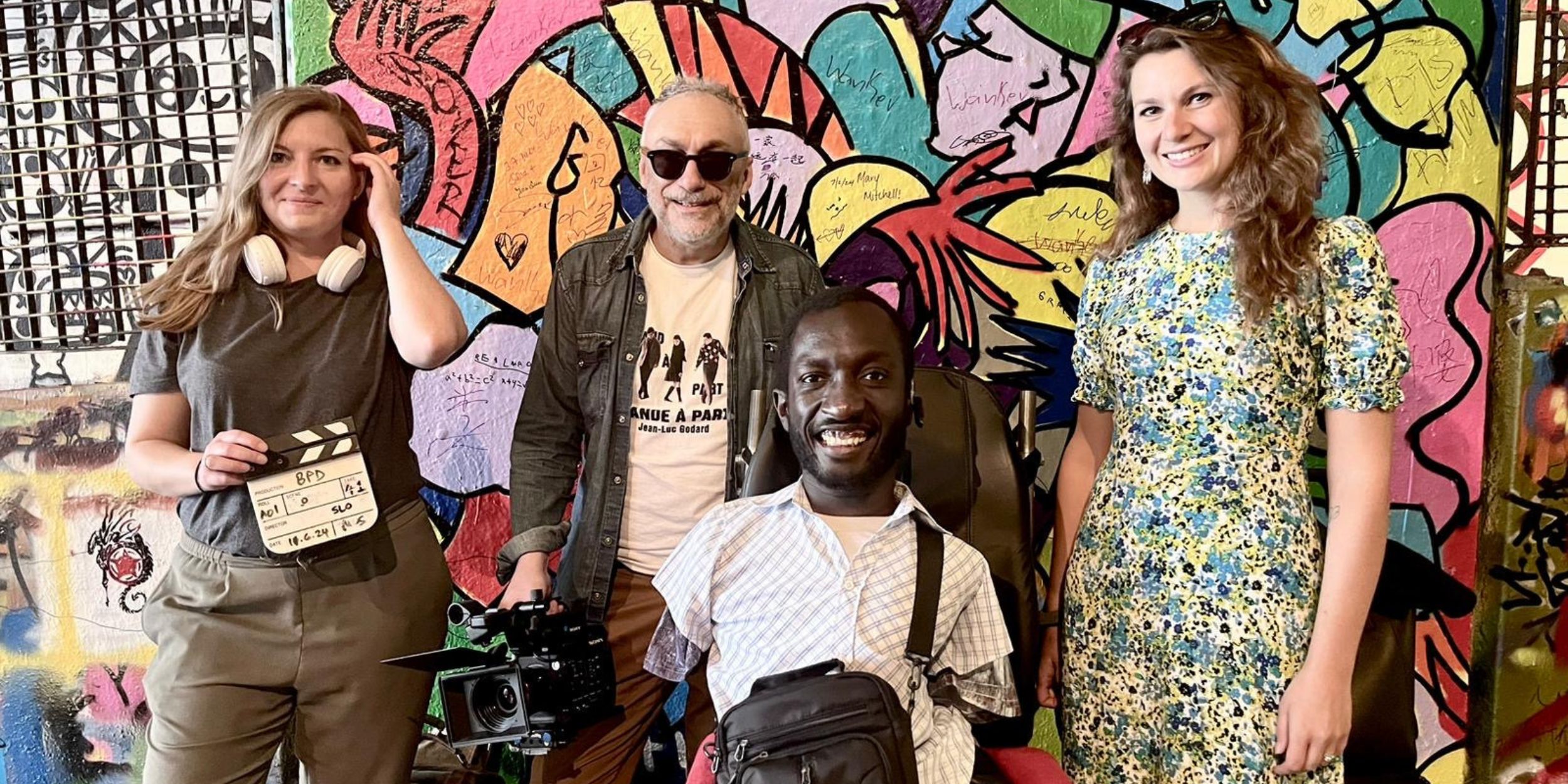 Emma Hames, Robert Crampton, Isaac Harvey and Solène Anglaret in front of a bright wall
