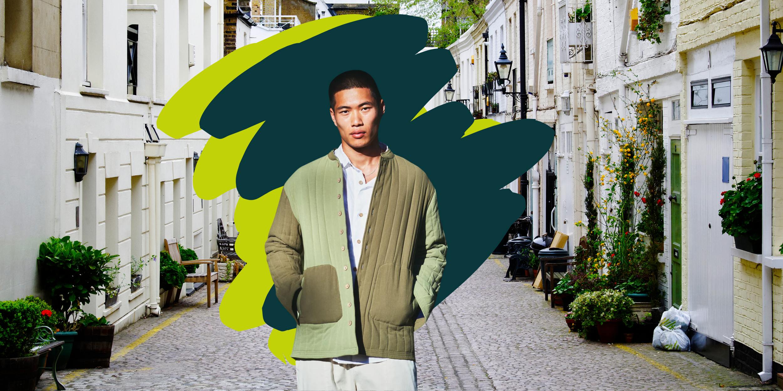Model wearing a Sustainable Menswear Milo Organic Cotton Jacket in Green Patchwork by Komodo in a London Mews