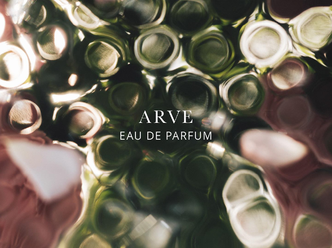 Arve Parfum logo with floral background
