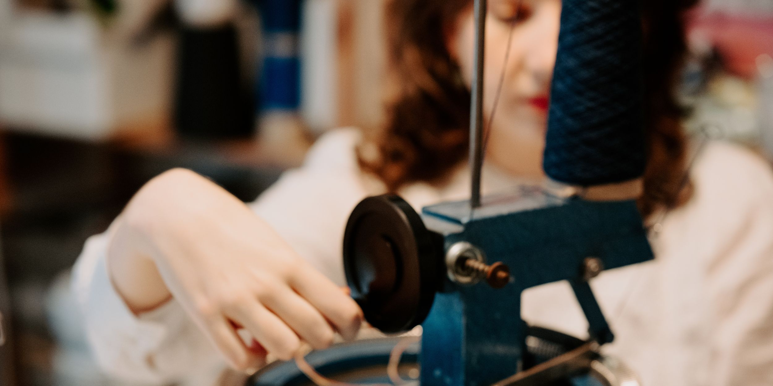 Elin Manon working on her knitting machine