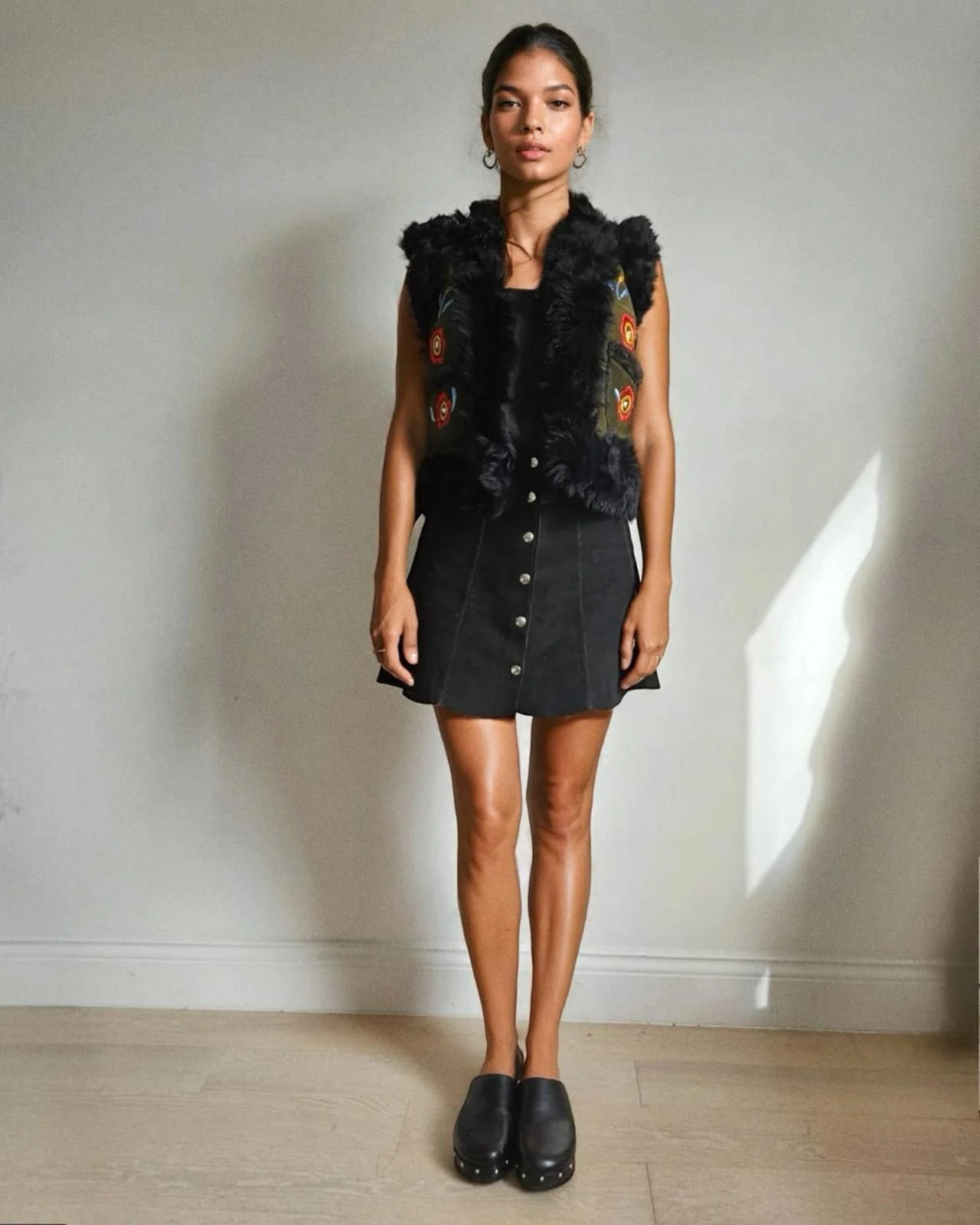 Salma Women's Vest on Model. Made From Suede and Mongolian Shearling