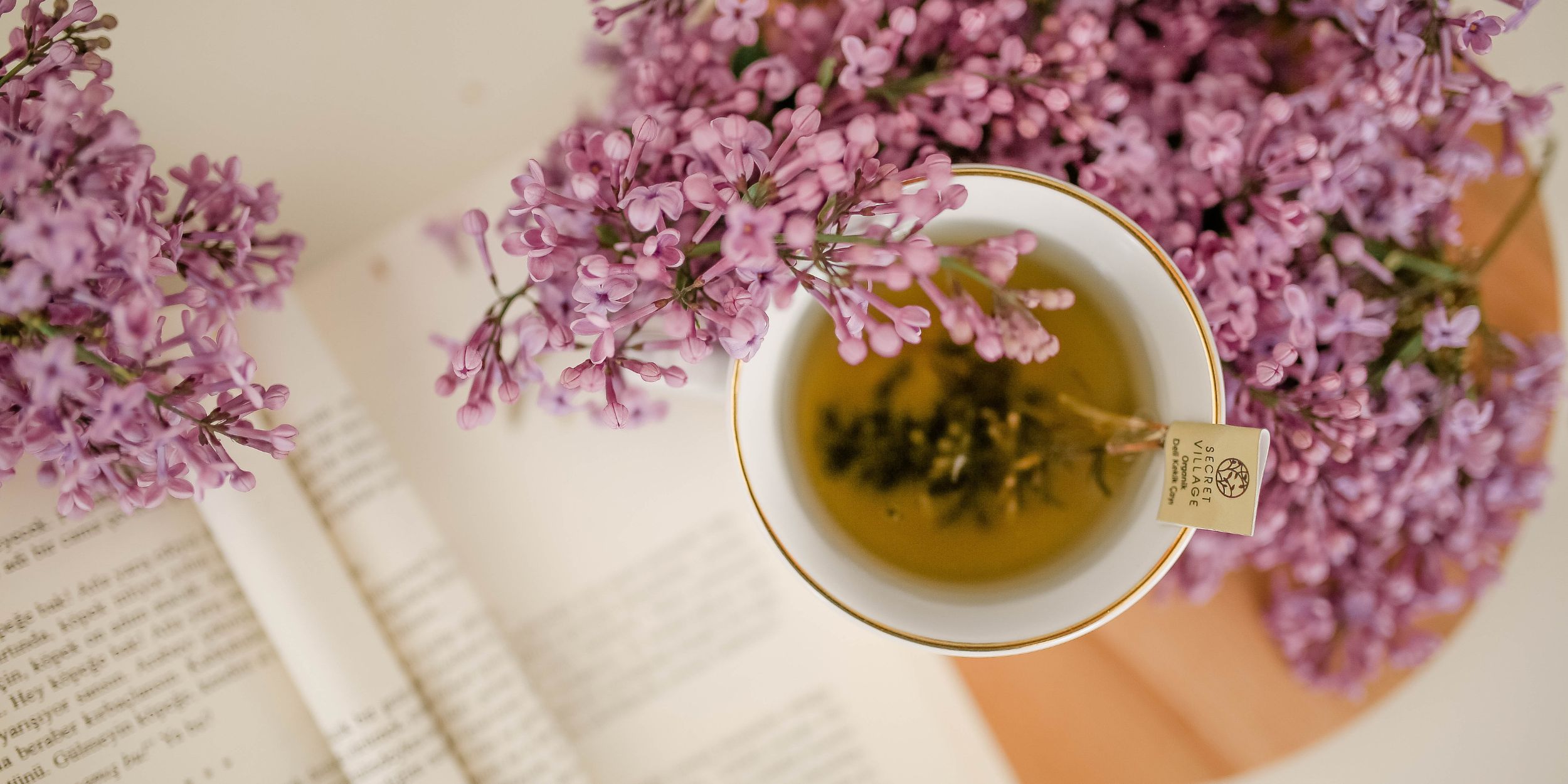 tea and flowers while reading the Beauty Industry Scorecard