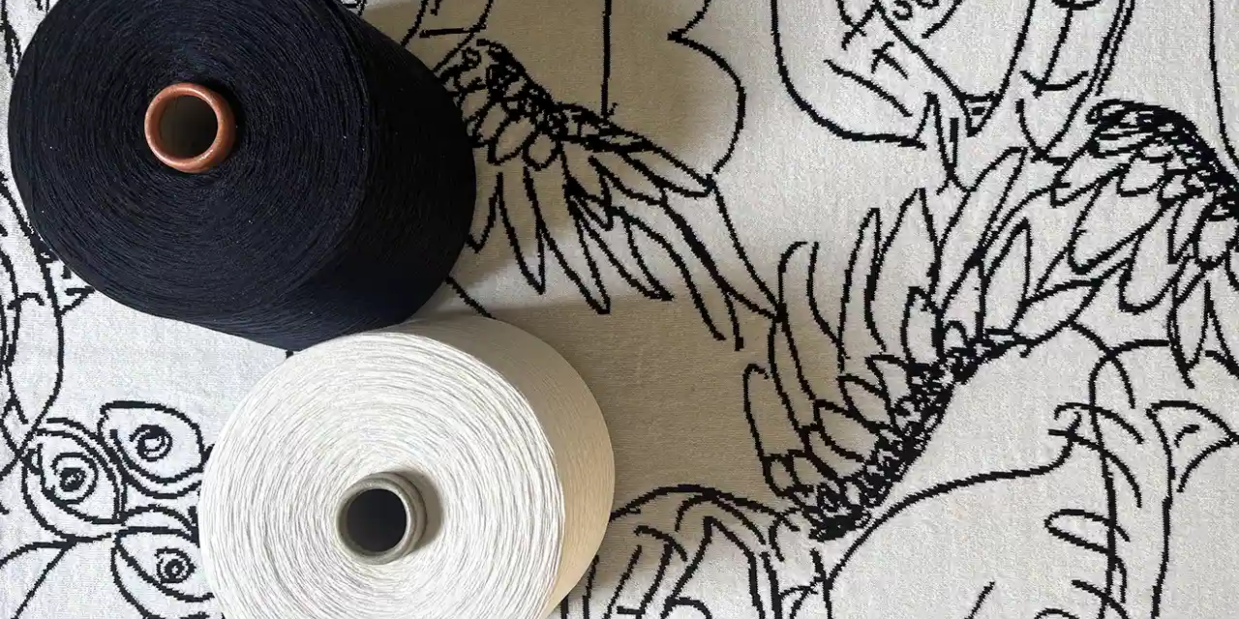 Relooped Scarf and cotton reels in black and white
