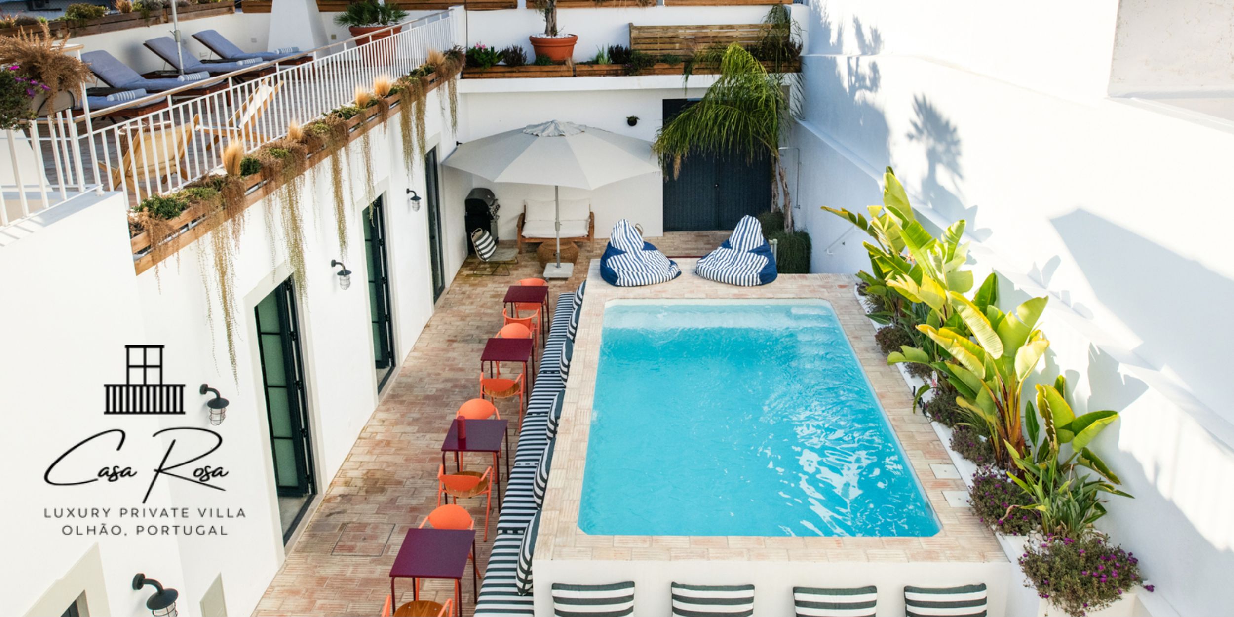 Casa Rosa Villa in Algarve, Portugal Poolside with deck chairs