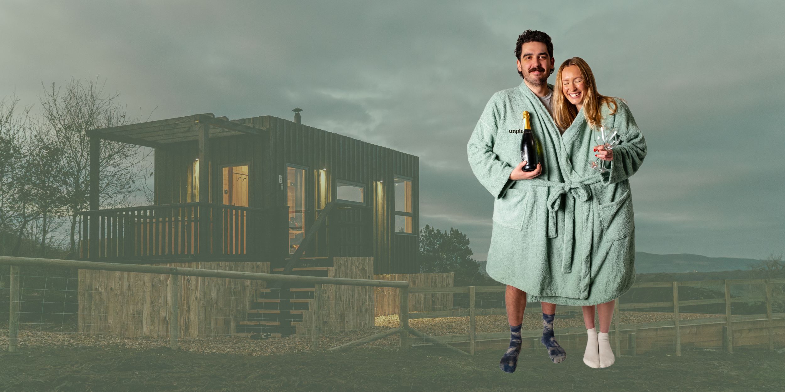 Unplugged Bracken Cabin with two people wearing the Unplugged Robe