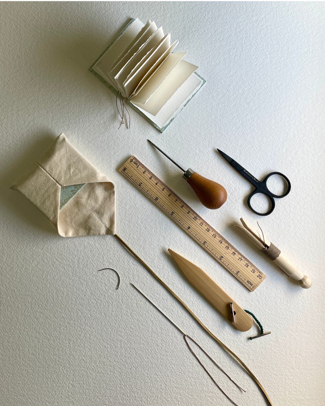 Book making paper and tools by Wan Lin Chang.