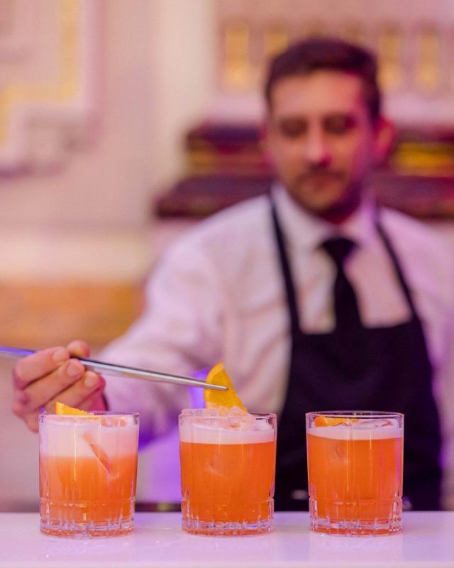 Making cocktails at a SAUVEUR Wedding, Image credit - Bizzy Arnott